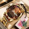 Dolly Parton In Our Memory Alloy Luxury Quartz Watch - angled close-up of gold-tone watch face