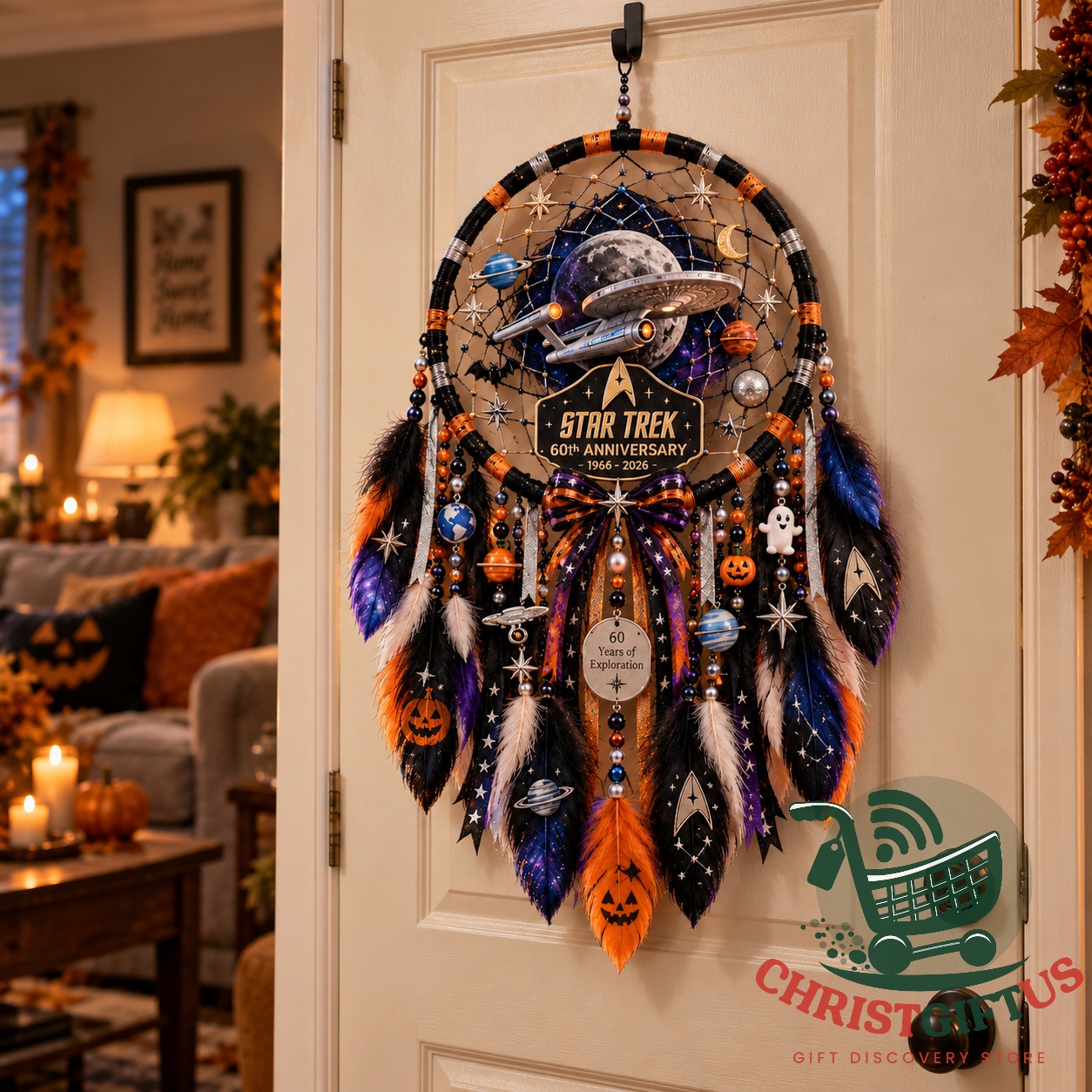 Detail of the Star Trek Halloween hanging showing feathers, beads and orange bow